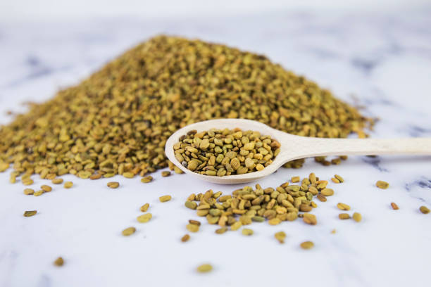 istock Fenugreek (Yellow tea, Methi, Shambala) seeds on white background 1061706752