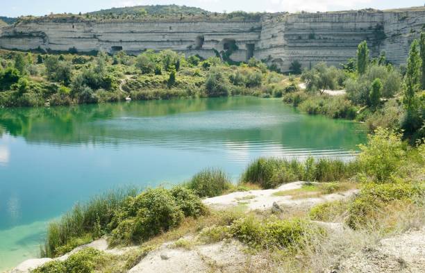 Lake in the quarries Mountain lake in old quarries in Inkerman near Sevastopol inkerman stock pictures, royalty-free photos & images