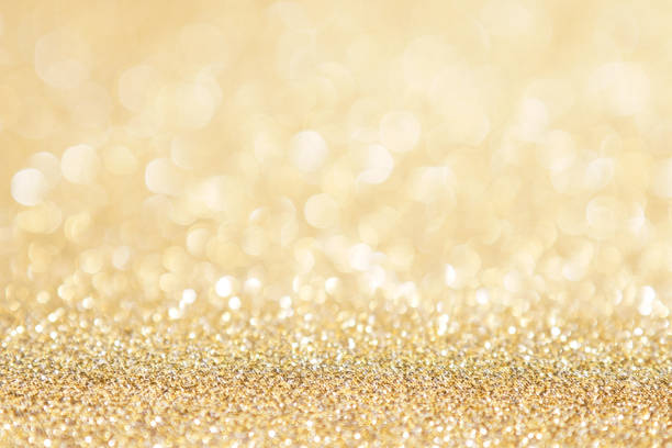 istock abstract background gold light bokeh christmas holiday 1061713442