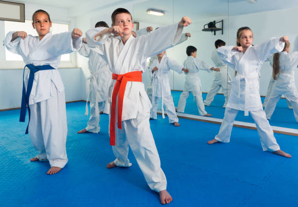 istock Young trainer is training teenagers 1061718652