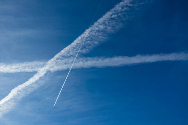 istock blue sky and the plane on the route 1061718924