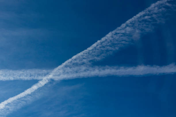 istock blue sky and the plane on the route 1061719164