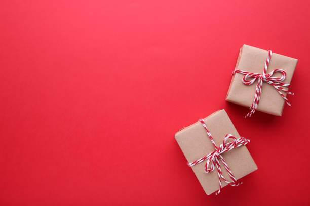 istock Christmas gifts presents on a red background. 1061727186