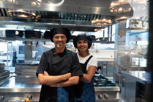 istock Couple of cooks working at a restaurant 1061735694