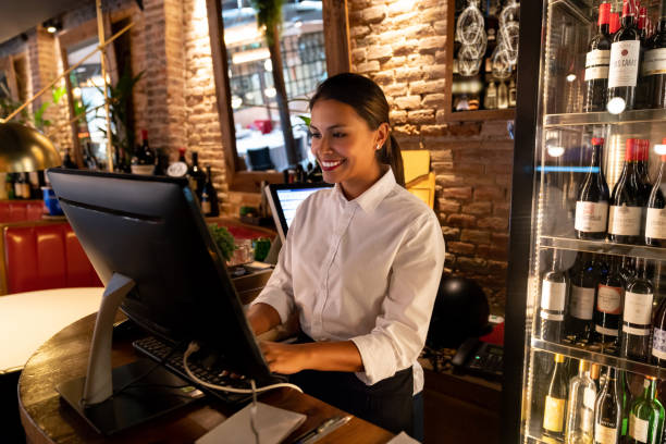 istock Woman working on the cashier at a restaurant 1061735862