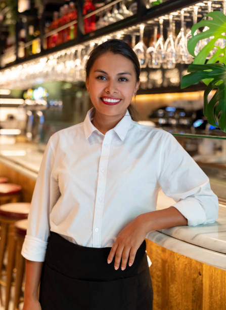 istock Happy waitress working at a restaurant 1061735890