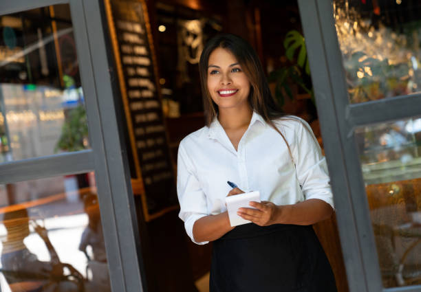 istock Beautiful waitress working at a restaurant 1061736030