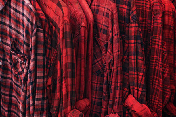 istock Red plaid shirts on the rack 1061739022