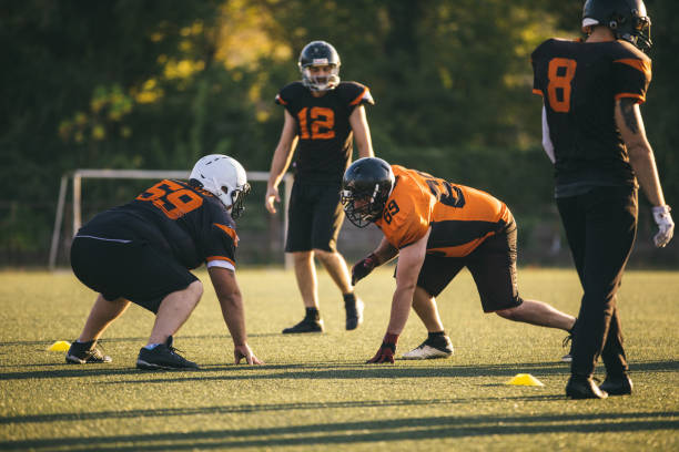 istock Playing American Football 1061742124