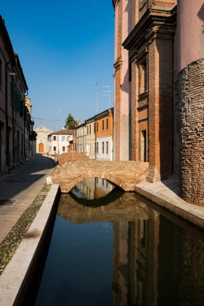 istock houses along canal in Comacchio (Little Venice), Italy 1061746212