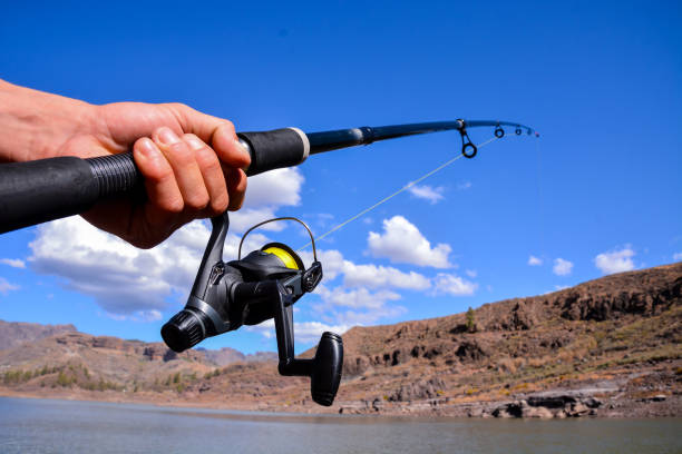 istock Fishing with rod on lake 1061749304