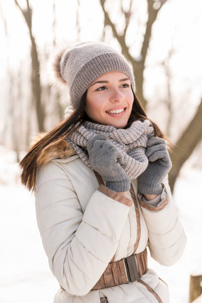 istock Beautiful woman in the snow 1061760068