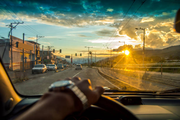 istock driving at the sunset,View from the driver angle car,the last hope 1061766038