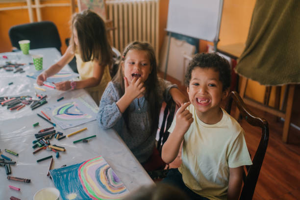 istock Group of children painting 1061769690