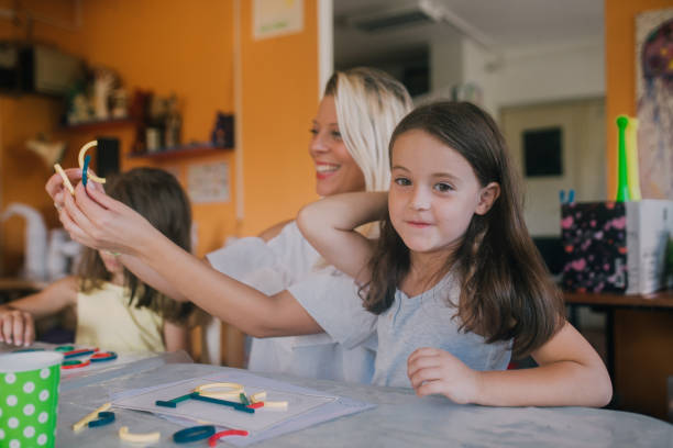 istock Young girl at art class 1061770298