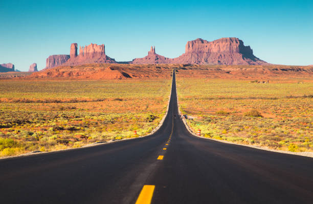istock Classic highway view in Monument Valley at sunset, USA 1061770404