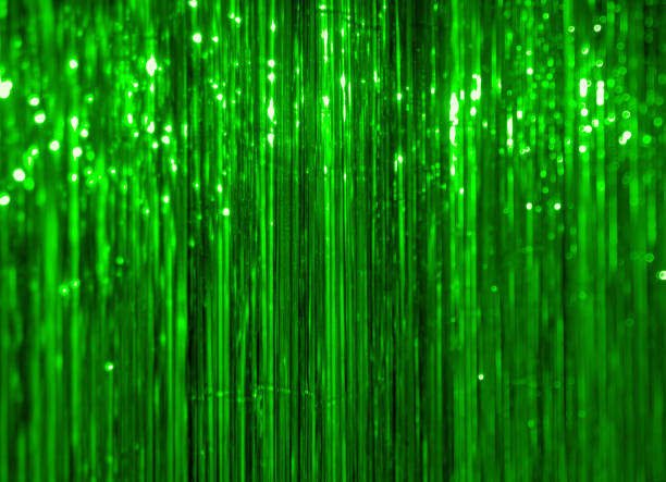 istock green, emerald, malachite Christmas tinsel background 1061772082