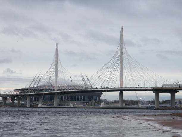istock Big cable-stayed bridge over the river in the evening 1061777764