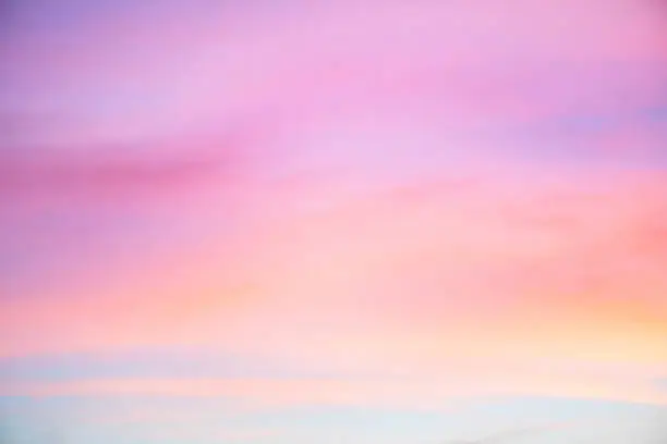 Sky in the pink and blue colors. effect of light pastel colored of sunset clouds
cloud on the sunset sky background with a pastel color