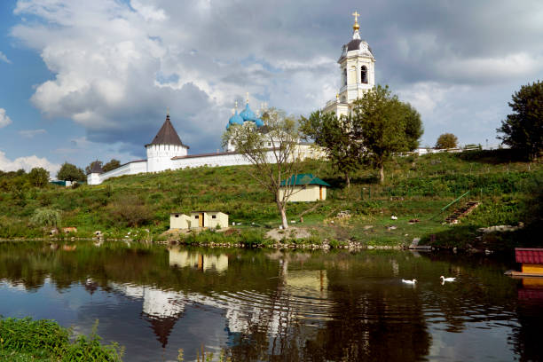 istock summer landscape with pond, monastery and ducks 1061794882