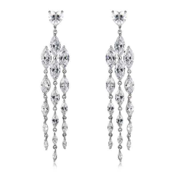 istock Pair of silver diamond earrings isolated on white background 1061798628