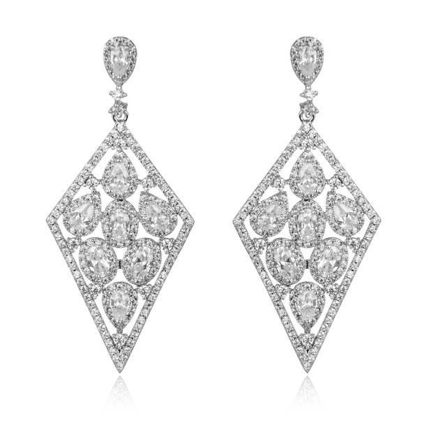 istock Pair of silver diamond earrings isolated on white background 1061798858