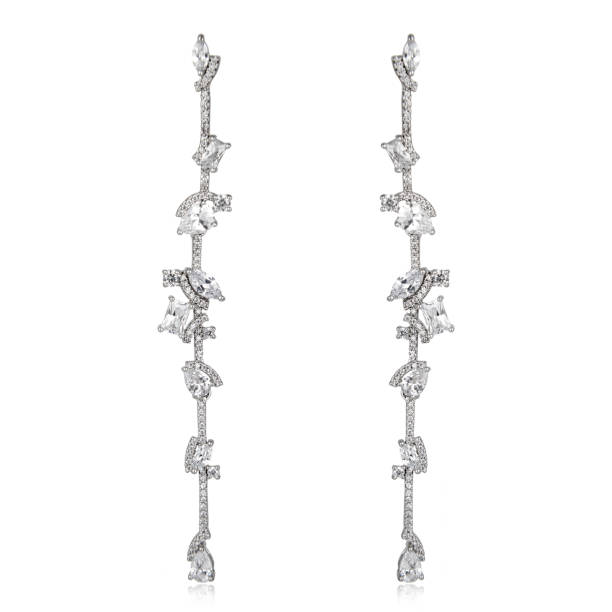 istock Pair of silver diamond earrings isolated on white background 1061799188