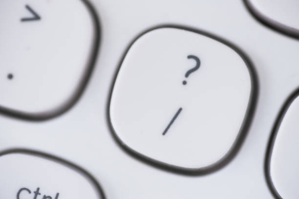 istock Close-up of Question mark key of a white keyboard. 1061799706