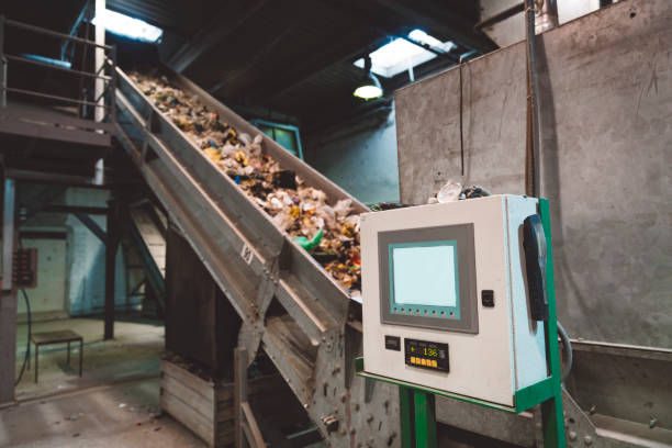 istock Converyor belt full of garbage 1061800802