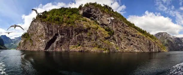 Landscape of a stony valley with mountains in the background. Norway. Summer. Stitched Panorama