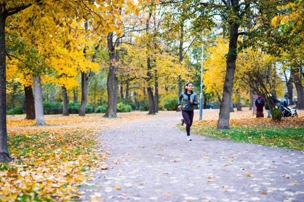 istock Female Athlete Running Outdoors. 1061814916