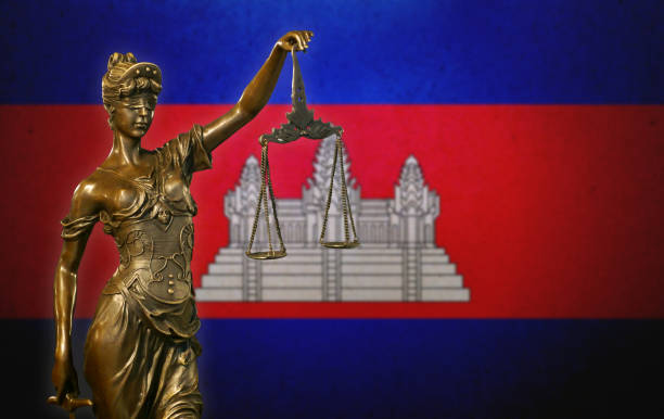 istock Lady Justice before a Cambodian flag 1061819634