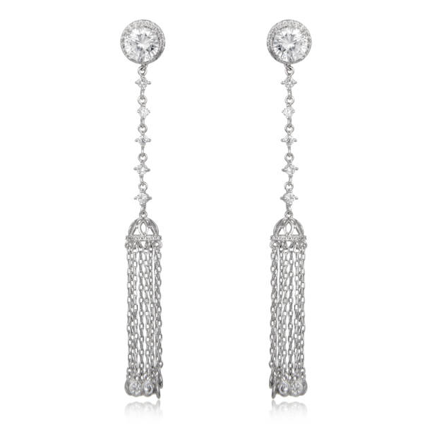 istock Pair of silver diamond earrings isolated on white background 1061824398