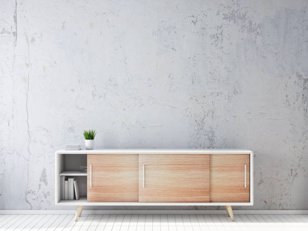 istock Empty concrete wall mockup with chest of drawers 1061825290