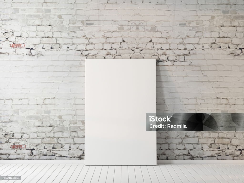 Poster mockup indoors on floor near brick wall Poster mockup indoors on floor near brick wall 3d rendering Artist's Canvas Stock Photo