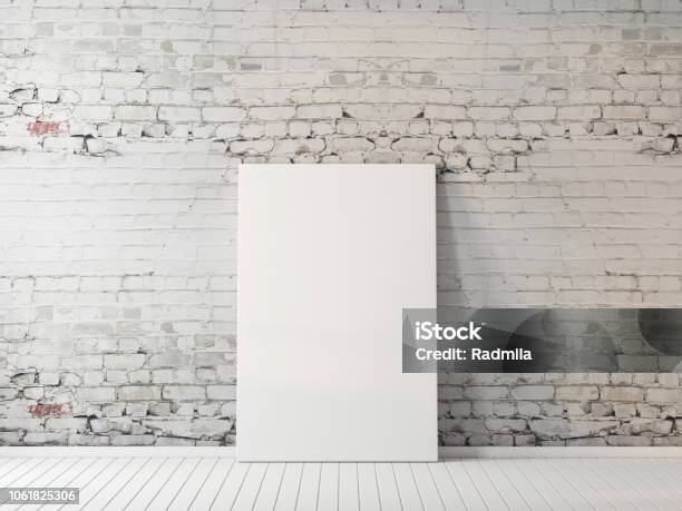 Poster Mockup Indoors On Floor Near Brick Wall Stock Photo - Download Image Now - Artist's Canvas, Blank, Wall - Building Feature