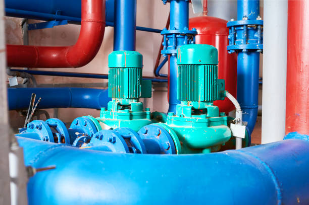 istock Blue engine with a pump connected to the blue pipes. 1061829538