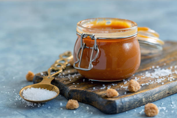 istock Glass jar with homemade salted caramel. 1061831906