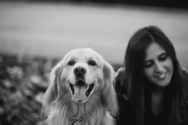 istock Young woman with dog 1061832834