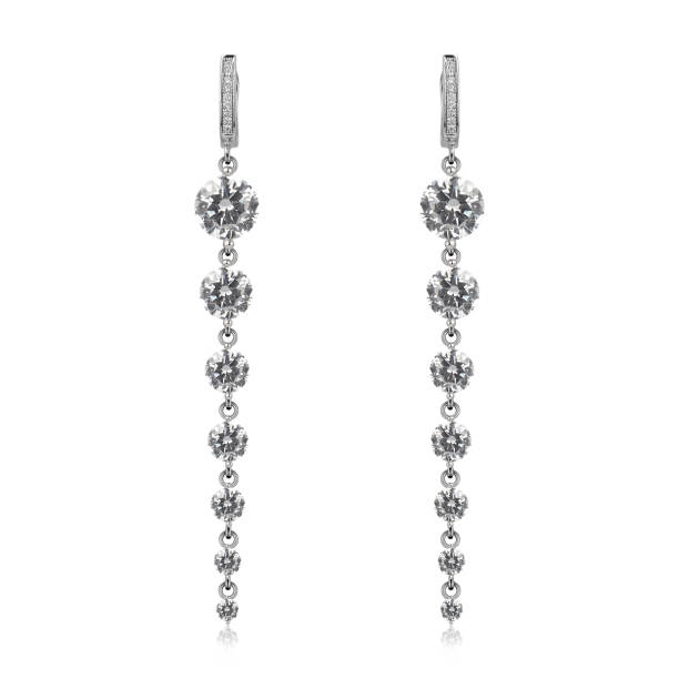 istock Pair of silver diamond earrings isolated on white background 1061832870