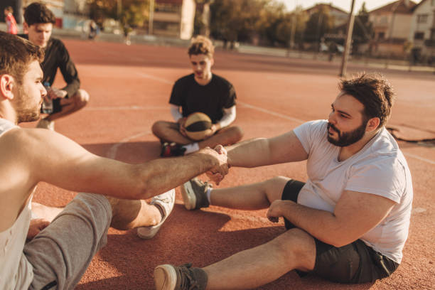 istock Streetball friends relaxing 1061834758