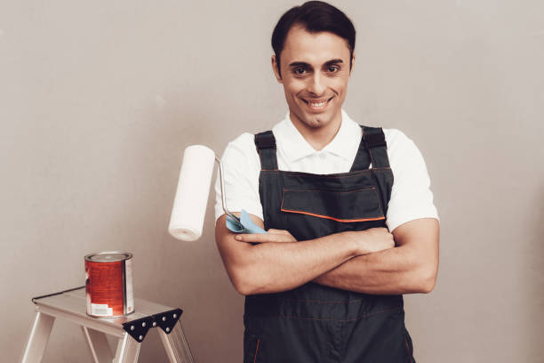 istock Smiling Arab Master with Paint and Brush in Hand. 1061845372