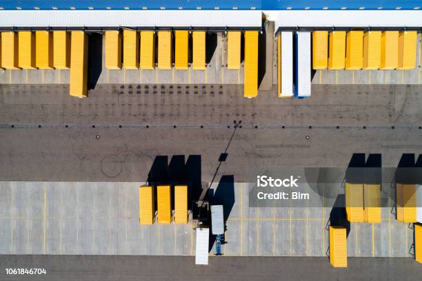 Aerial View Of Cargo Containers And Distribution Warehouse Stock Photo - Download Image Now