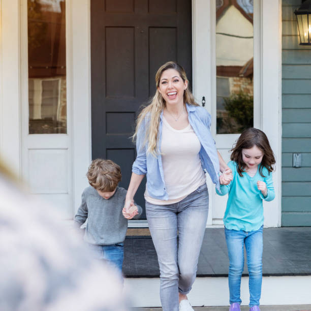 istock Family welcoming dad home from overseas deployment 1061847804