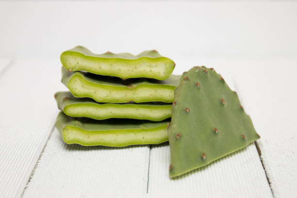 istock Sliced opuntia ficus-indica cactus leaf on a white background 1061849138
