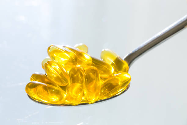 istock Healthy supplements with Omega 3 fish oil 1061851364