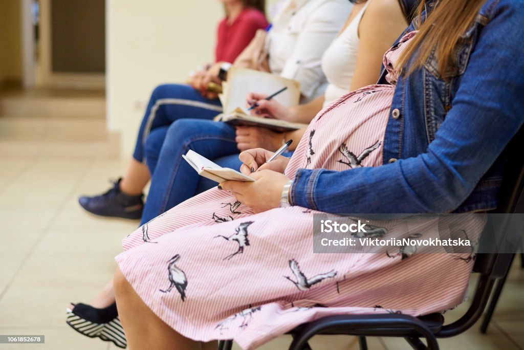 A pregnant woman in courses for expectant mothers. Pregnant Stock Photo