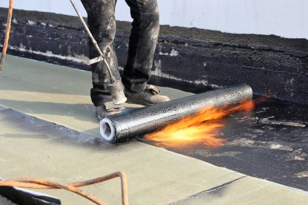 istock Waterproofing flat roof with bitumen sealing membranes 1061858632