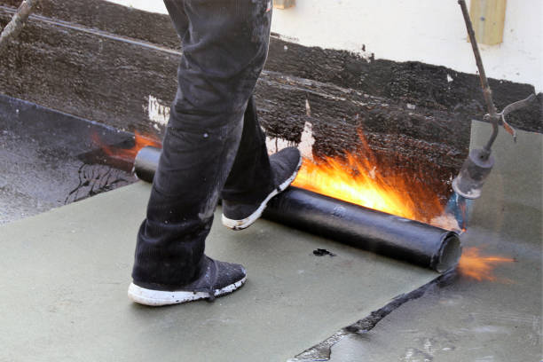 istock Waterproofing flat roof with bitumen sealing membranes 1061858730