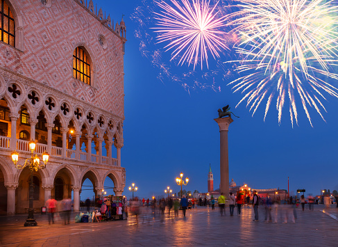 Square San Marco with Doges palace at night with festive fireworks, Venice, Italy